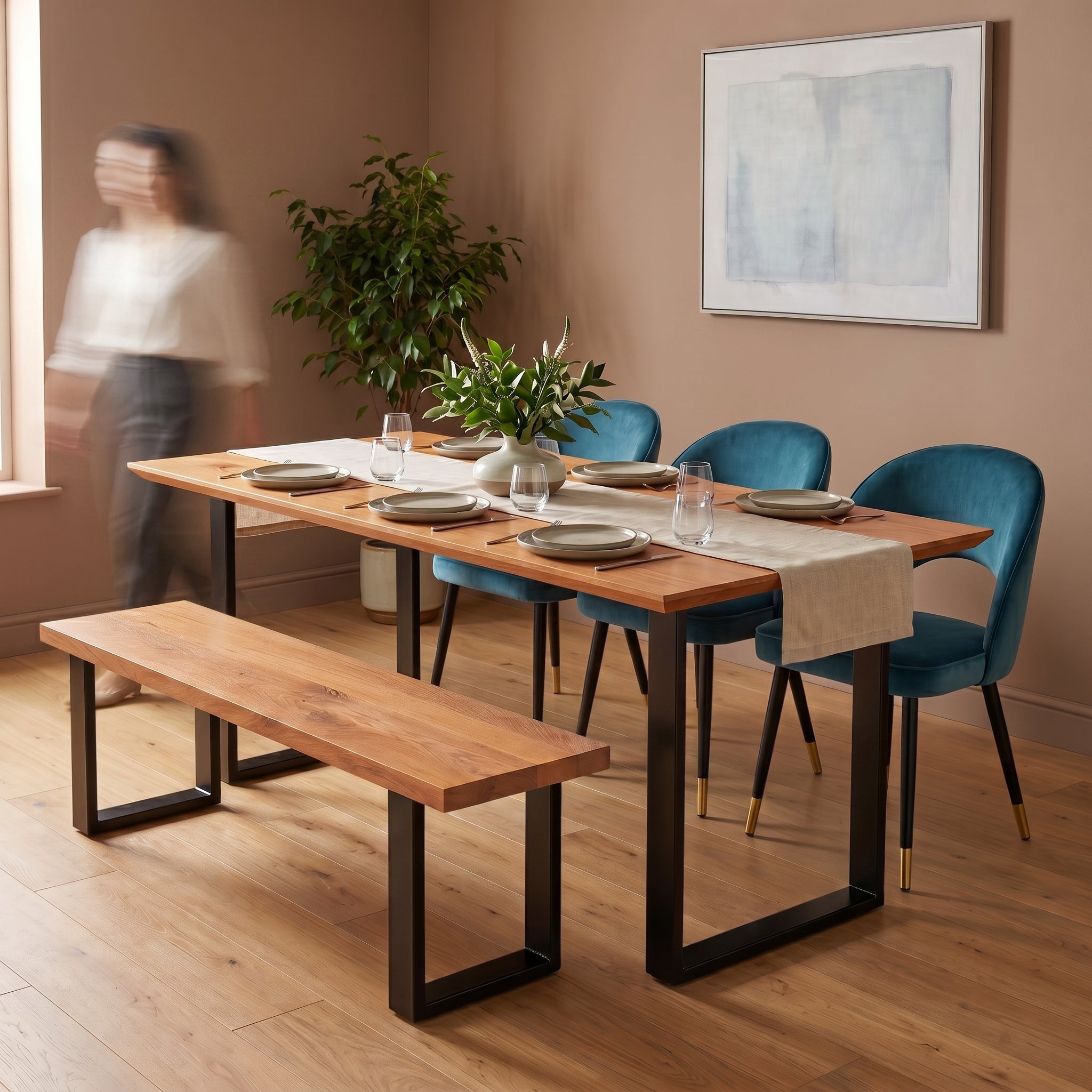 Dining room with antique bronze wooden table, blue chairs, and a matching bench.