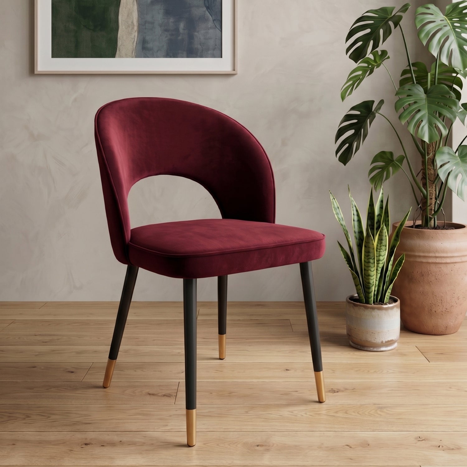 A curved velvet dining chair with a calm, sculptural feel