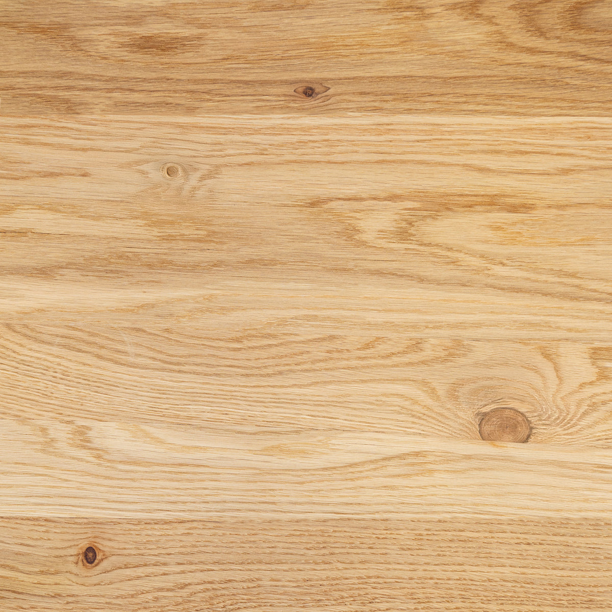 Light natural full stave oak wood grain surface with visible knots and horizontal wood texture, filling the frame.