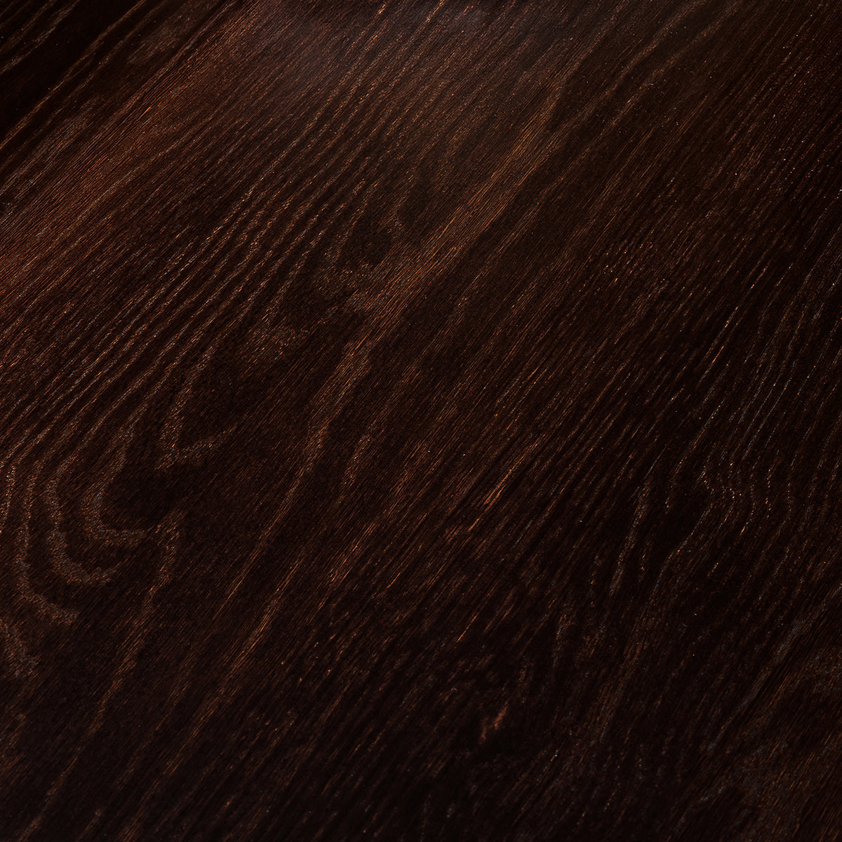 Oak wood grain texture in a walnut finish with visible natural patterns and tonal variation.