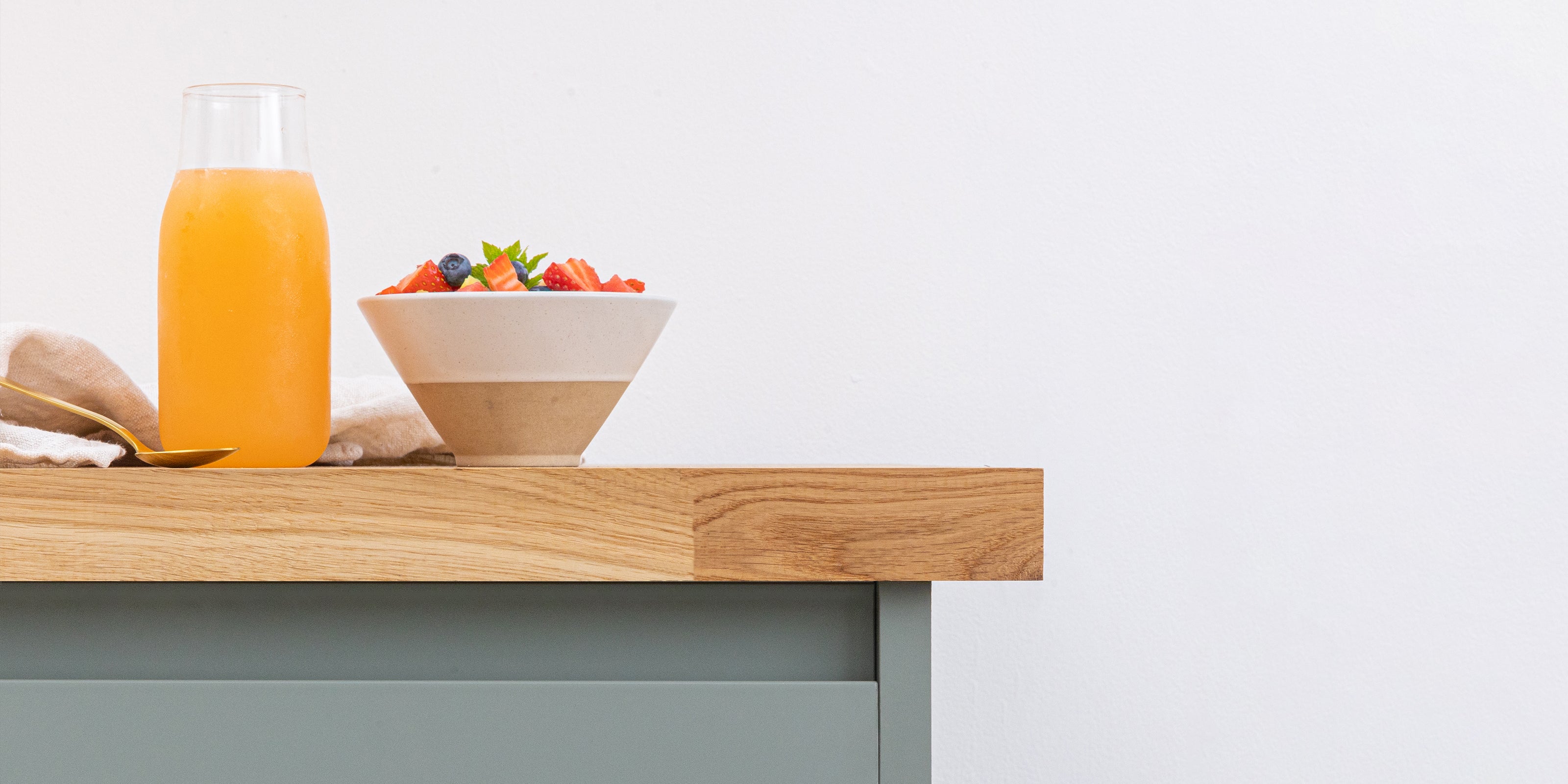 Solid oak worktop edge showing natural grain detail.